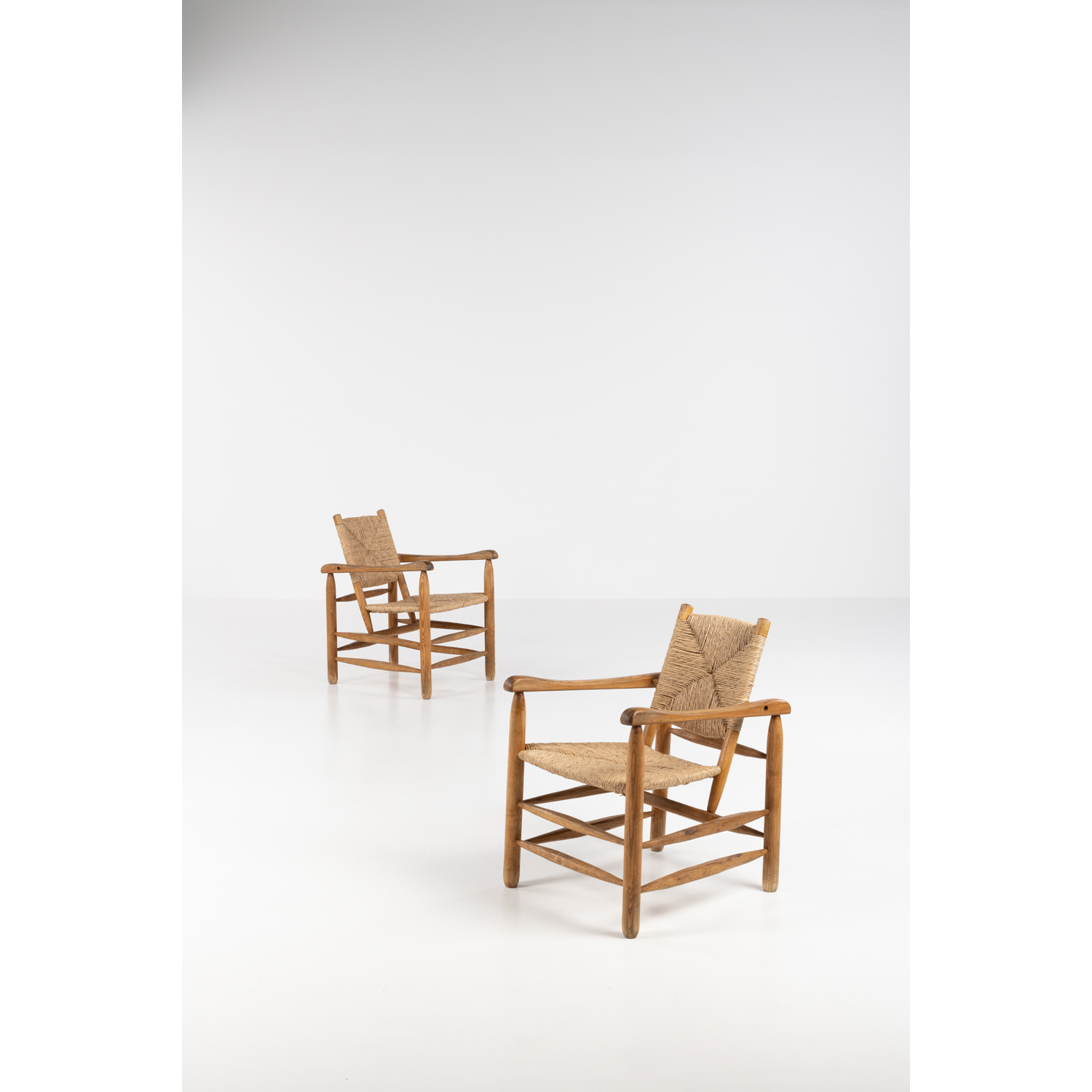 Pair Charlotte Perriand Model No. 21 Lounge Chairs, France 1950